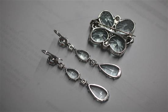 A cased early to mid 20th century 9ct white gold, aquamarine and diamond set demi-parure,